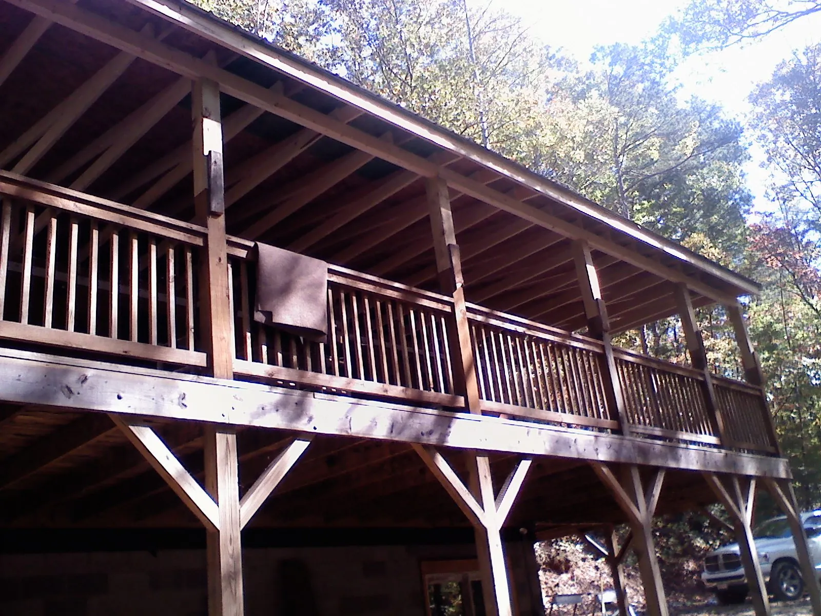 Timber framing under a new elevated porch and deck — Roof Leak Repair in Elk Horn by Roofing Brothers